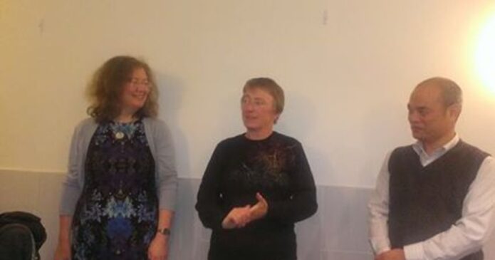 Tracey Bourner (centre) receiving the Wong Doo Award 2014